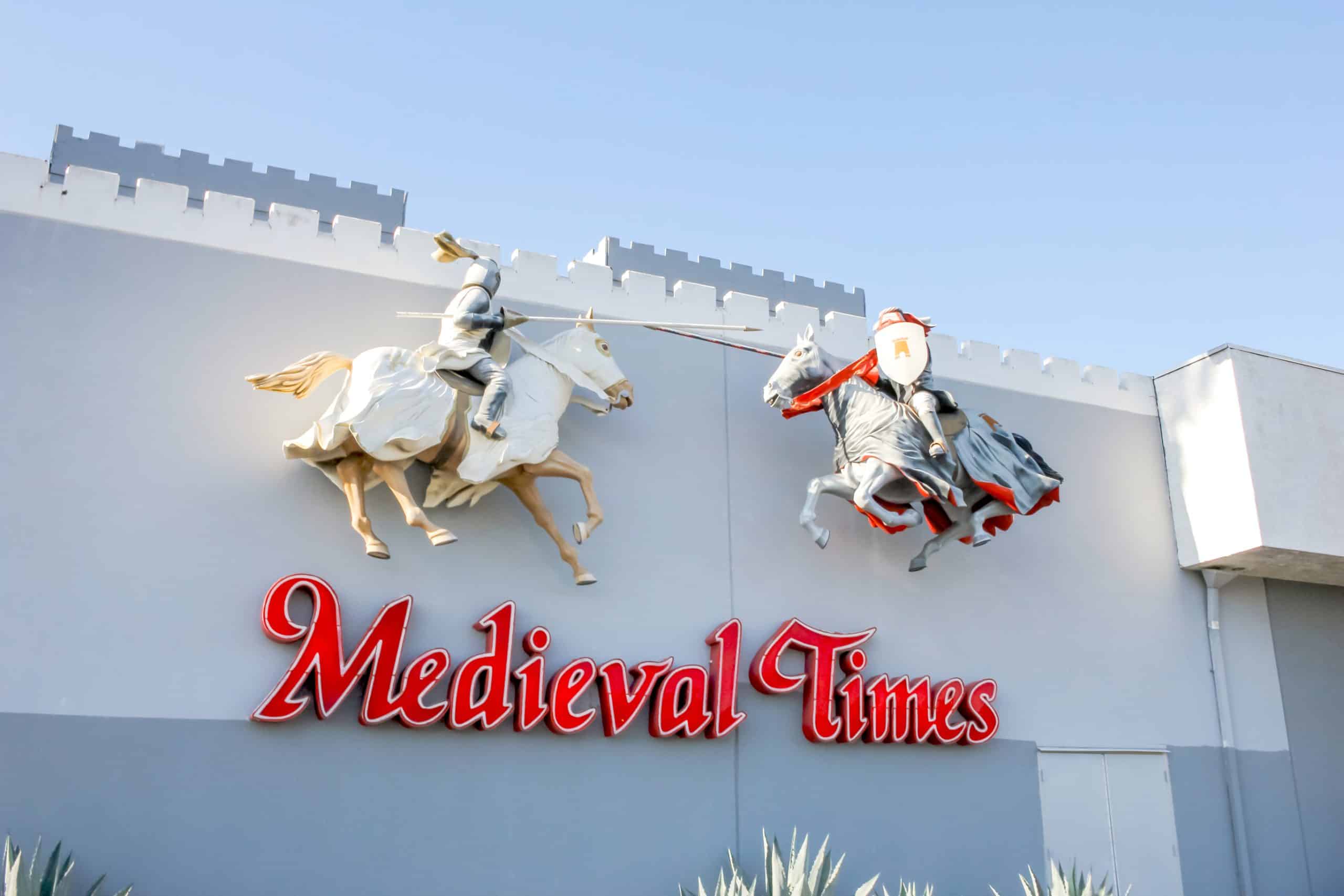 Medieval Times entrance with jousting knight statues.