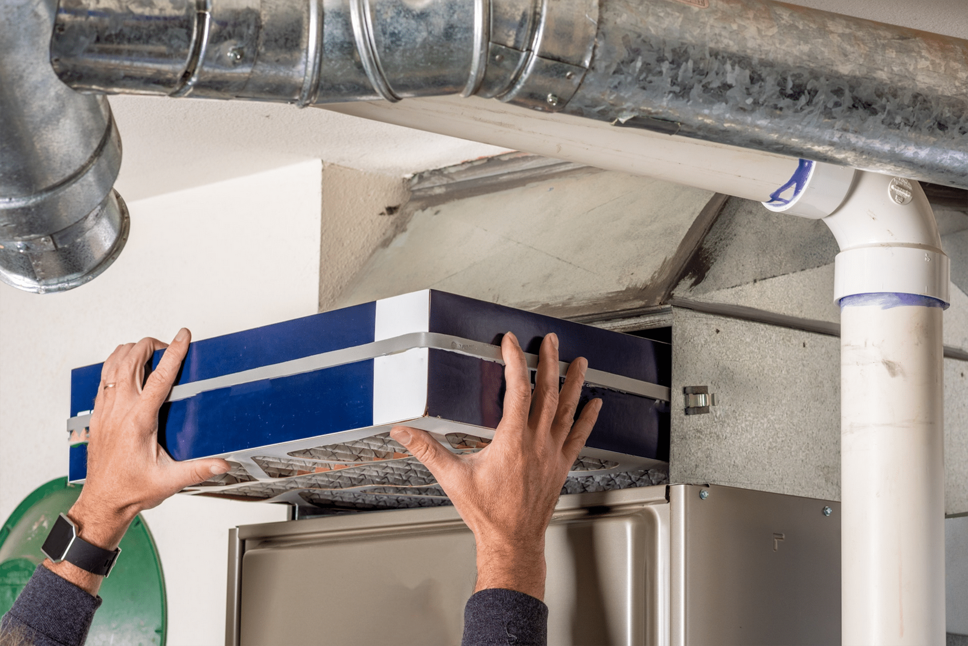 Screenshot 2025-10-27 at 13-54-12 dreamstime_m_792683631.jpg (JPEG Image 1936 × 1549 pixels) — Scaled (85%) Changing HVAC air filter in ceiling duct