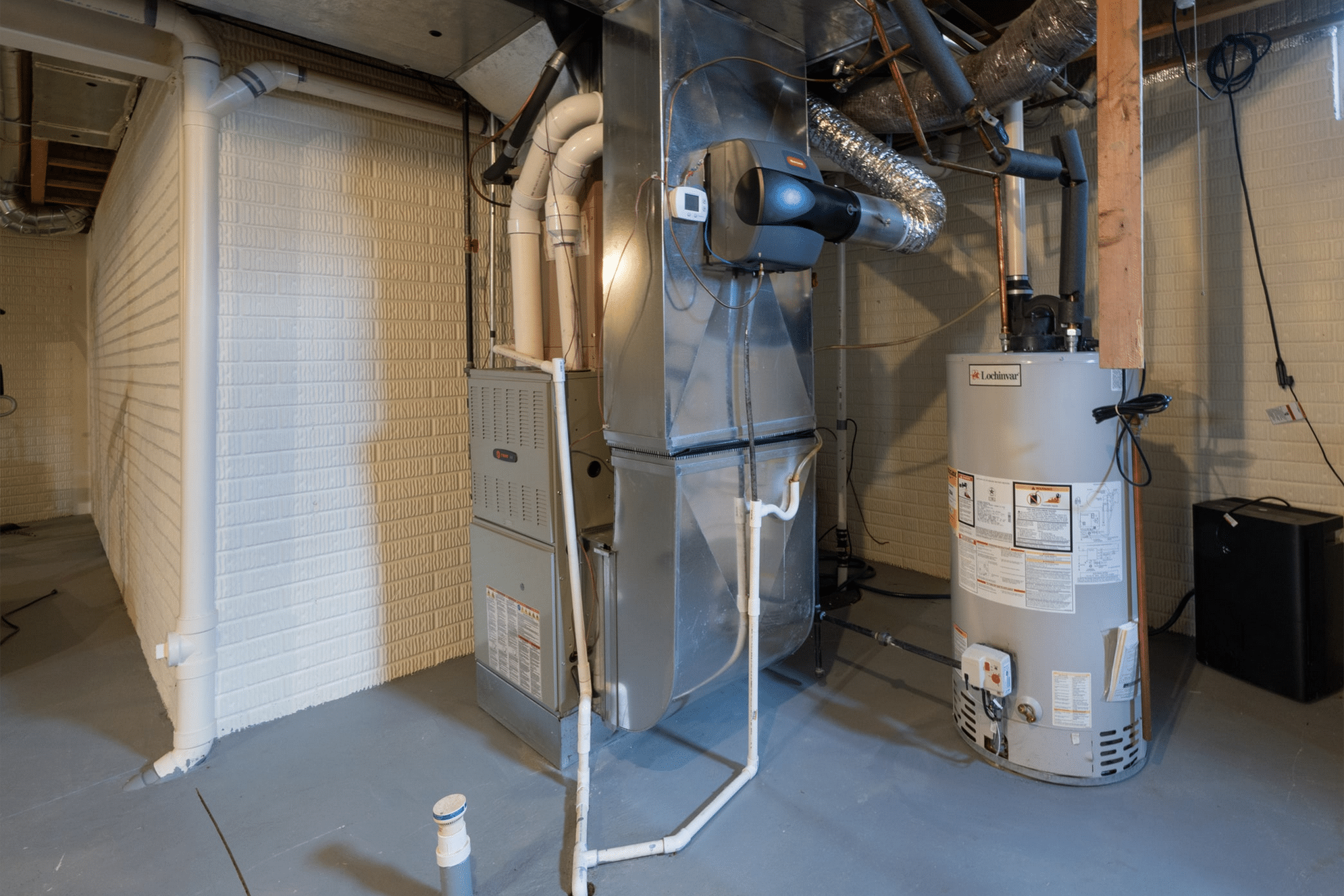 Screenshot 2025-10-27 at 13-54-23 dreamstime_m_386558226.jpg (JPEG Image 2089 × 1434 pixels) — Scaled (92%) Basement HVAC system and water heater installation.